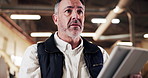 Carpentry, thinking and man on tablet in workshop for planning, inspection and woodworking. Carpenter, mature and person on tech for inventory, furniture design and checklist for timber production