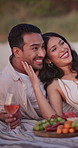 Smile, couple and relax in nature for travel, picnic and romantic date for summer holiday. Happy, people or scenery outdoor with wine glass, partner affection and bonding together on vacation getaway