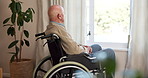 Senior, man and thinking with window in wheelchair for nostalgia, past moment or memory in home. Thoughtful, elderly or male person with a disability for reminisce, reflection or remember in house