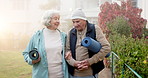 Walking, mat and senior couple outdoor for exercise, conversation or bonding together. Happy, yoga equipment and elderly man with woman for cardio in morning with connection, talking or love.