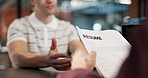 Interview, recruitment and hands in office with resume, portfolio or meeting in onboarding process. Contract, people or hiring in agency with document, candidate or proposal for career opportunity