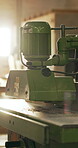 Manufacturing, workshop and closeup of woodworking machine, craftsmanship and power tool for design. Creative, furniture production and equipment to shape timber, carpentry and remodeling in factory