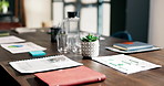 Boardroom, empty and office with documents for financial review, analytics and statistics for profit. Background, corporate and paperwork with business graphs, charts and research for finance report