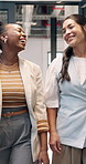 Friends, laughing and women in office, arrival and discussion with coworker or planning for project. Business, morning and happy people with ideas for assignment, funny conversation and walking