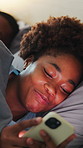 Couple, bedroom and woman with phone for secret text, cheating or suspicious for infidelity. Jealousy, night and African people on cellphone for online dating, ignore or relationship conflict in home