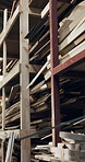 Shelf, wood and timber in workshop for carpentry, inventory and planks supply for production. Empty, factory and lumber in storage for renovation, joinery and woodworking for manufacturing furniture