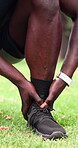 Fitness, massage and hands in park with ankle pain, cardio injury and physical risk in exercise. Discomfort, man or athlete in nature with overworked joint, tendinitis or muscle strain in workout.
