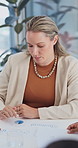 Business, woman and talk in meeting with documents, training and finance graph for accounting. Team, reading and paperwork in office for coaching, data analytics and stats report for financial audit