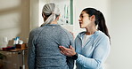 Physical therapy, women and shoulder blade pain in session for healing, consultation and healthcare. Person, senior patient and injury with rehabilitation, chiropractic and joint wellness or massage