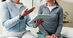 Physio, hands and old woman in office with tablet, medical research or explain injury rehabilitation. Senior person, healthcare worker and talk with tech, wellness advice and feedback for recovery.
