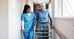 Nurse, old woman and help with walker in hallway for mobility, balance and support in retirement. Patient, caregiver and elderly person with disability, frame or rehabilitation for healing in house