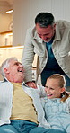 Relax, family and support with laughing in home for funny conversation, bonding and trust. Parents, grandparents and happy children with joke for weekend break, healthy relationship and connection