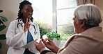 Consulting, pills and doctor with senior woman for prescription, medication and medical service. Healthcare, talking and person explain with medicine, antibiotics and tablets for patient treatment