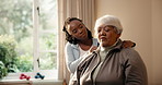 Women, massage and old person with shoulder pain for retirement, assessment and stiffness for recovery. Physiotherapist, patient and help in office for checkup, injury and rehabilitation progress
