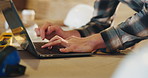 Carpentry, workshop and hands of man on laptop for furniture order, project dimensions or email. Typing, computer and person for planning, schedule update or timber inventory for woodworking business