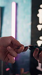 Hands, people and pos machine with credit card in shop for tap payment, tattoo service or sale. Small business, owner and customer with debit transaction for body art, booking fee deposit or checkout