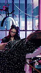 Creative, tattoo artist and woman with client in shop, skills and ink design with tool and aesthetic. Unique, process and person with equipment for body art, self expression and identity in store