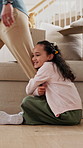 Hang, walking and kid on leg of father in home for separation anxiety, attachment or bonding. Moving, boxes and girl child clinging on dad for attention, connection or comfort in living room at house