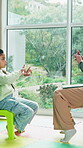 Learning, office and woman with child for sign language, communication and development. Speech therapy, session and teacher with hand gesture, education and teaching girl for conversation skills