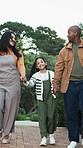 Love, walk or interracial family in park with holding hands, childcare or bonding on weekend break. Support, parents or girl outdoor with stroll, loving moment or fun activity in happy connection.