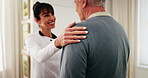 Health, old man and caregiver with support in home for medical progress, follow up and wellness. Hand on shoulder, senior patient and carer in homecare for routine checkup, healing and recovery news