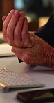 Hand, pain and keyboard with business man in office for fibromyalgia, typing fatigue and injury. Rheumatoid arthritis, pressure and carpal tunnel with mature employee for overworked and strain