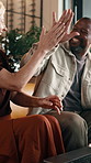 High five, paper and interracial couple with home finance, mortgage approval or investment profit. Savings goal, mature man and woman with shock for asset growth, excited and laughing with laptop
