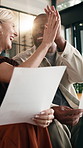 High five, document and interracial couple with home finance, mortgage approval or investment profit. Savings goal, mature man and woman with paper for asset growth, excited and laughing for success