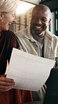 Finance, home or happy couple with documents for budget planning, investment or expenses together. Interracial people, man and woman with paperwork for financial assessment, profit or report in house