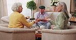 Talking, tea and support with old people on sofa in home for chat, connection or brunch visit. Social gathering, reunion and retirement with senior friends in living room of apartment for dessert