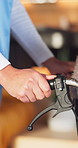 Nurse, walking and hands with wheelchair for assisted living, healthcare or support in home. Caregiver, health worker or pushing person with a disability for mobility, assistance or service in house