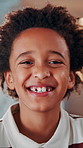 Boy, face and home with pride for childhood development, growth or care for holiday or youth. Portrait, happy child or kid with smile, confidence or positive attitude for break or weekend in house