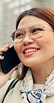 Phone call, laugh businesswoman in city with communication, negotiation or finance agreement. Happy, commuting and Asian financial manager on mobile discussion for investment contact in urban town.