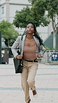 Business, black woman and running in city for hurry, rush hour and panic for workplace emergency. Late, female person and sprinting in town with urgency, missed meeting and pressure for late arrival