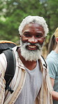 Talking, happy and people in forest for hiking, backpacking and walking for tourism, trip and travel. Nature, outdoor and men with women on trail for fitness, exercise and trekking for fresh air
