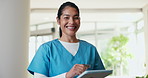 Hospital, happy and face of nurse on tablet for online report, schedule and medical service in clinic. Healthcare, portrait and woman on digital tech for telehealth, website and internet for planning