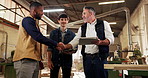 Shaking hands, tablet and men in warehouse for carpentry, manufacturing and flare with team. Furniture, handshake and woodwork people in factory with tech for workshop, collaboration or project deal