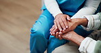 Caregiver, above and holding hands with senior woman for empathy, compassion and emotional support. Nursing home, comforting and nurse with elderly person for sympathy, wellness and care for bonding