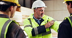People, safety and reflective jacket in factory with discussion, explain rules and gear for carpentry. Manager, men and talk in workshop with PPE, woodwork manufacturing and compliance with protocol.