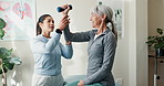 Old woman, stretching and dumbbells in office for physio, assessment and medical for mobility injury. Physiotherapist, help and senior person at clinic for physiotherapy, healing muscle and treatment