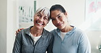 Face, physiotherapist and old woman at clinic with smile, checkup and medical for injury recovery. Portrait, person or senior patient with embrace, physiotherapy and healing muscle for rehabilitation