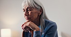 Elderly, woman and thinking with cane in retirement home for nostalgia, past moment or reminisce. Thoughtful, senior or female person contemplating with walking stick for old memory or daydreaming