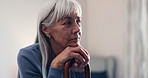 Senior, woman and thinking with cane in retirement home for nostalgia, past moment or reminisce. Thoughtful, elderly or female person contemplating with walking stick for old memory or daydreaming