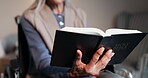 Reading, bible and senior woman in wheelchair, Christian and worship with holy scripture or religion. Praise, God and old person with disability, faith and studying spiritual guide in nursing home