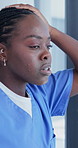 Nurse, stress and black woman with window for mistake, failed procedure or regret in hospital. Thoughtful, female person or doctor with bad news or migraine for fatigue, doubt or clinical error