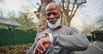 Happy, black man and smart watch in nature for fitness, progress and heart rate from exercise. Smile, mature person or laugh at park with wristwatch, tracking health and notification for sports stats