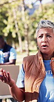 Volunteer, team and woman with clipboard for food drive, charity event and outreach for non profit. Park, talking and people with checklist for groceries, parcel and donations for aid, help and ngo