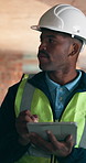 Construction, happy and man on tablet for inspection, planning and building evaluation. Architecture, engineering and African person on tech for assessment, research and compliance for renovation
