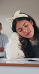 Students, throwing and sleeping girl in classroom, playful prank and disruption for sleep deprivation. Tired, child and nap at school with peer interaction, paper ball and exhausted for boring lesson