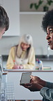Student, friends and playing with phone in classroom for distraction in lesson or session. Boy, girl or teenagers laughing with smartphone in exam for cheating, disruptive behavior or cyberbullying